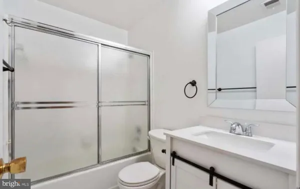 a view of a kitchen with a sink cabinets and a window