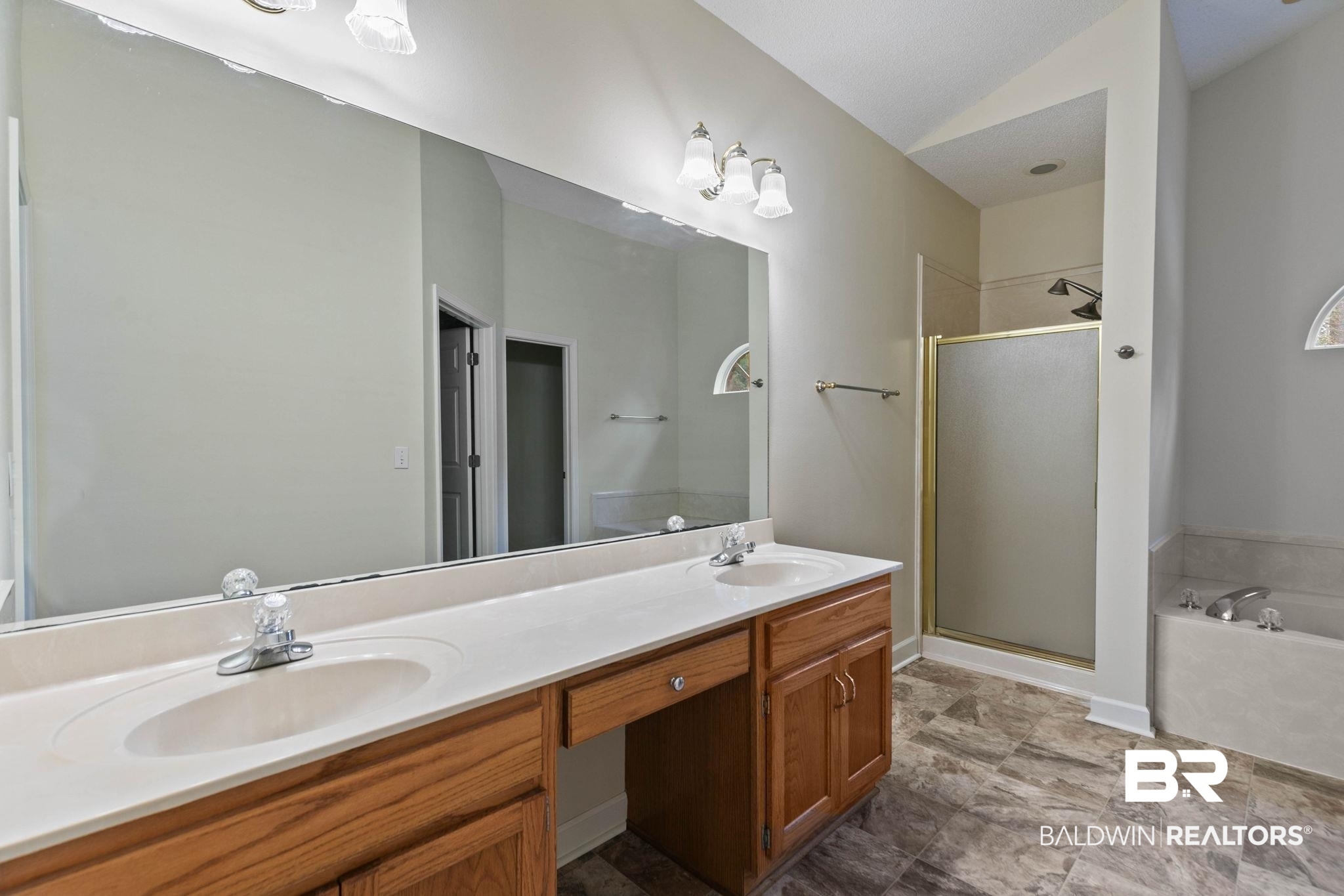 32185 Buzbee Road Daphne, AL 36527 - Photo 22 of 47 Bathroom with a stall shower, double vanity, and a bath