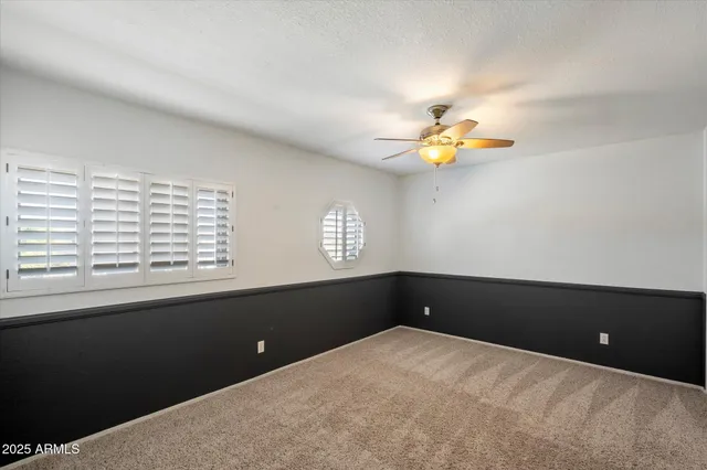 a bathroom with a toilet and a sink