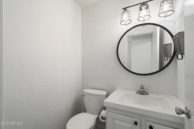 a bathroom with a sink a toilet and a bathtub