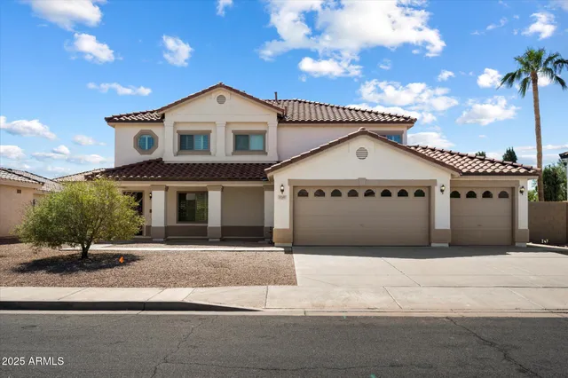 a view of a kitchen with a stove and wooden floor