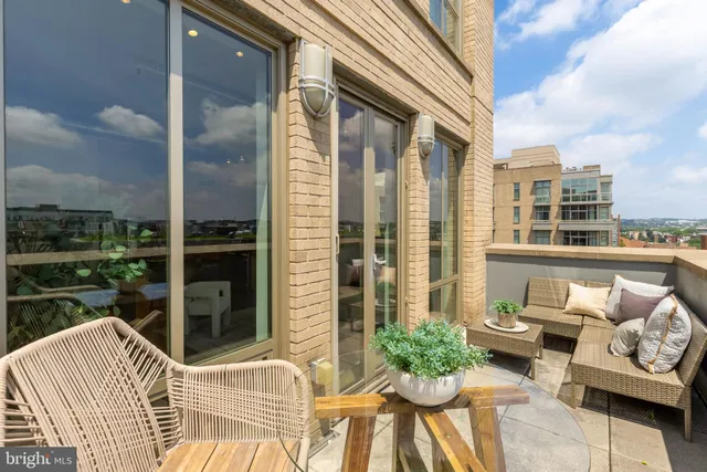 a view of a chairs and table in the terrace