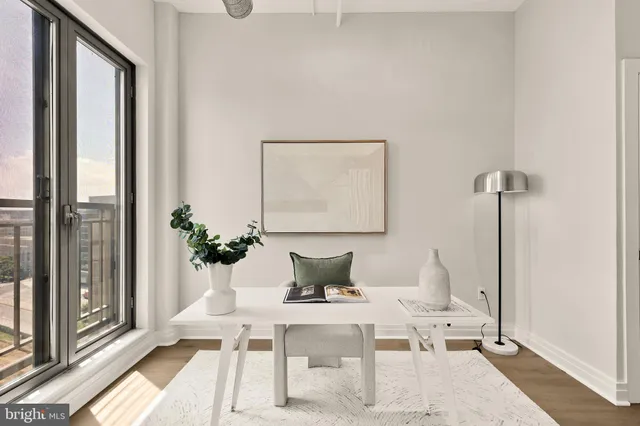 a view of a hallway with washer and dryer