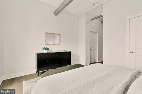 a bathroom with a shower and a toilet