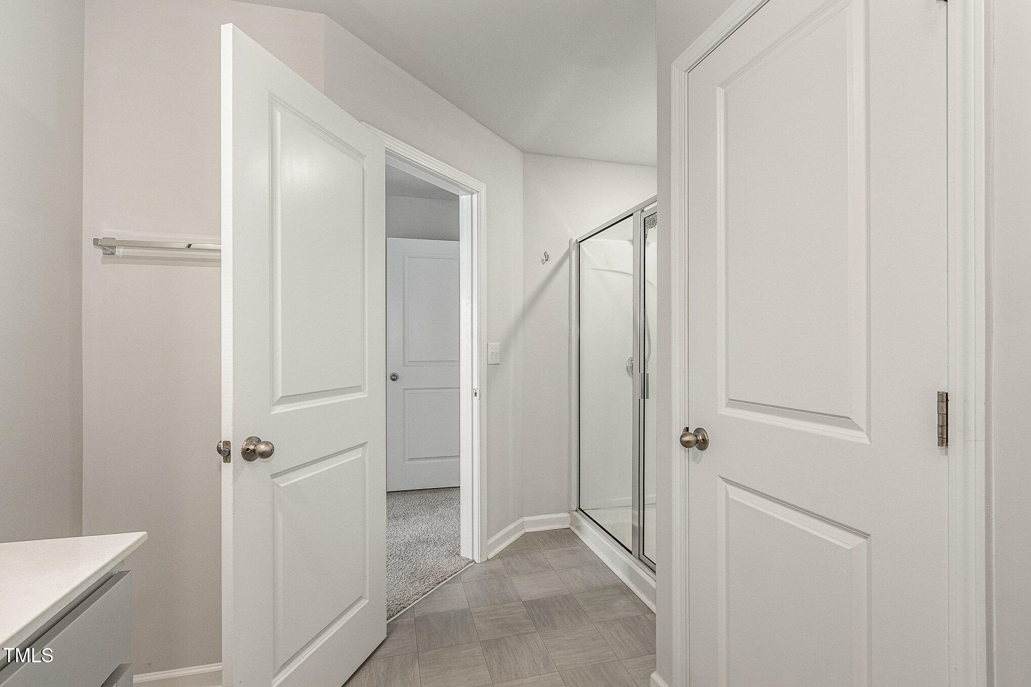 1230 Adrian Court Mebane, NC 27302 - Photo 20 of 31 a view of a hallway with closet and a bathroom