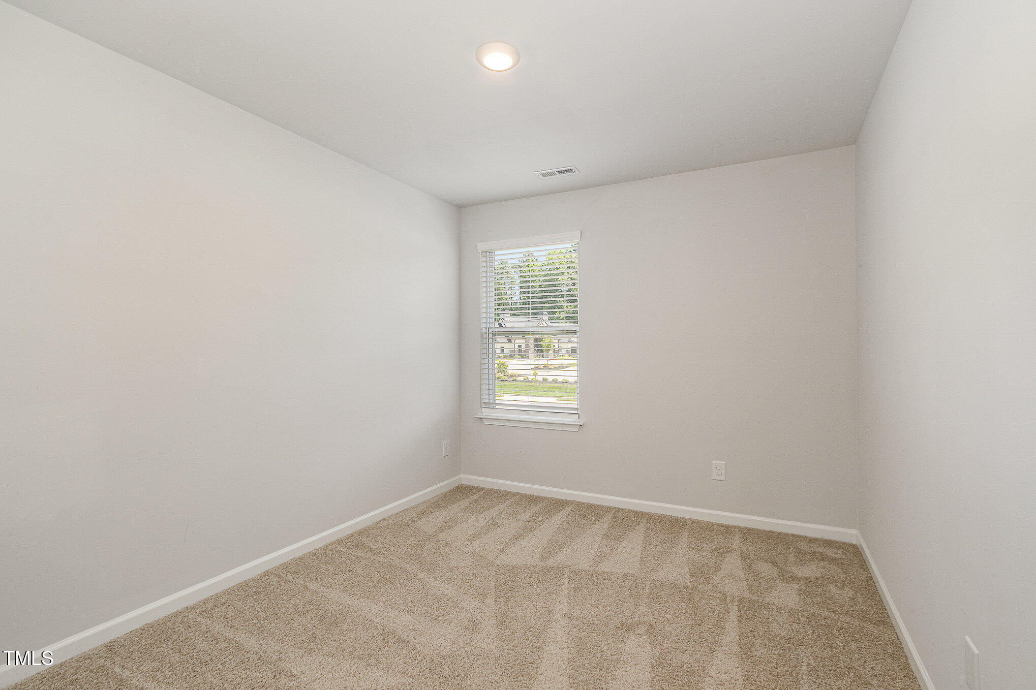 1230 Adrian Court Mebane, NC 27302 - Photo 21 of 31 an empty room with a window