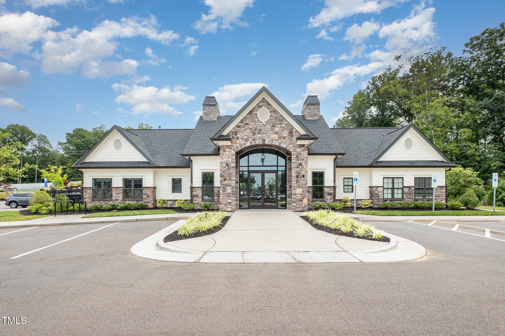 1230 Adrian Court Mebane, NC 27302 - Photo 29 of 31 a front view of a house with a garden