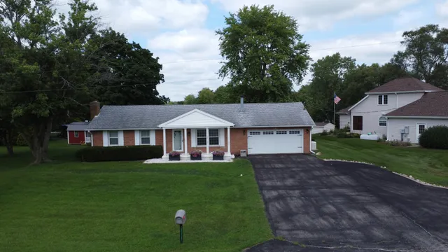 a view of a house with a big yard