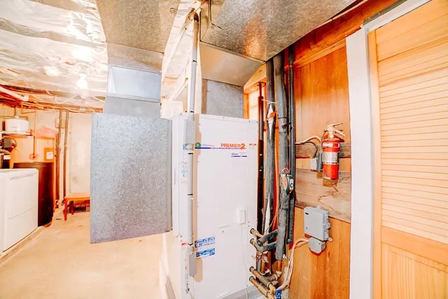 a view of a lake with top of house