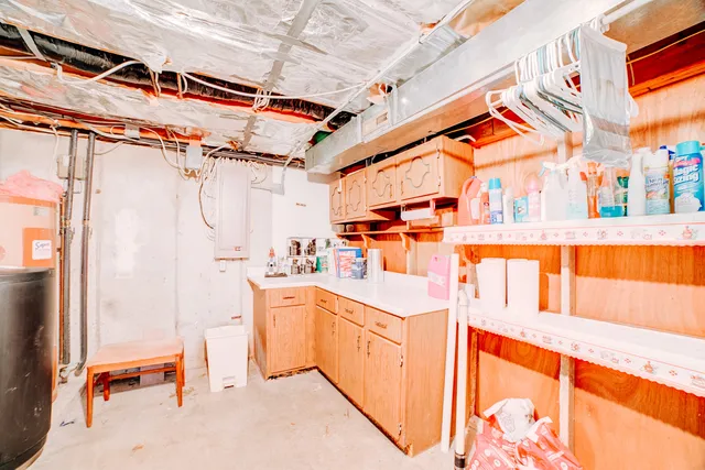 a view of a lake with houses in the back