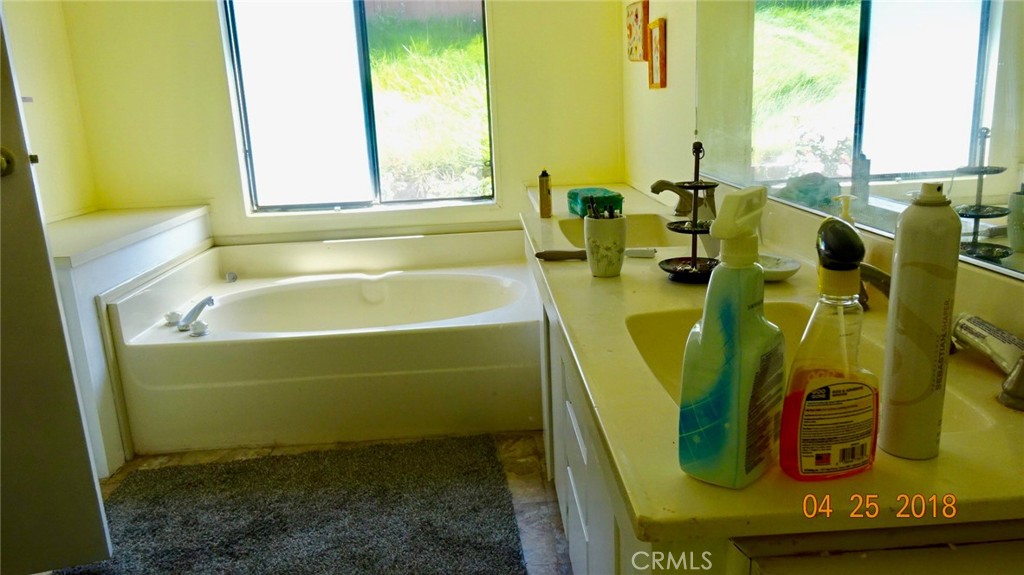 954 Bluejay Drive Santa Maria, CA 93455 - Photo 11 of 22 a bathroom with sink and bathtub