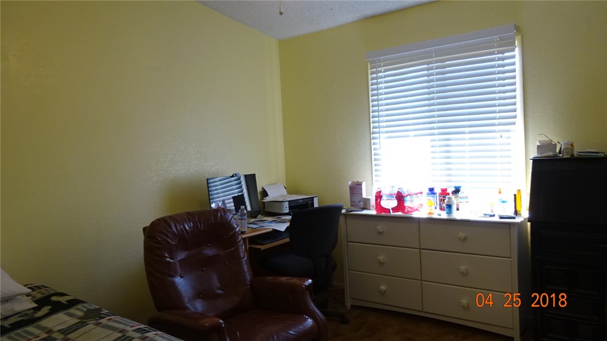 954 Bluejay Drive Santa Maria, CA 93455 - Photo 13 of 22 a room with furniture and a window