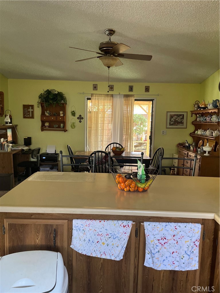 954 Bluejay Drive Santa Maria, CA 93455 - Photo 8 of 22 a room with furniture a window and a lamp