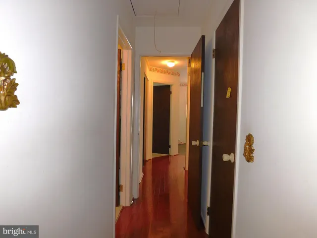 a view of a bathroom with a tub and a sink