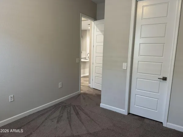 a view of storage and utility room with washer and dryer