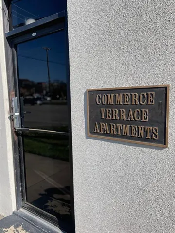 a bathroom with a shower and a sink