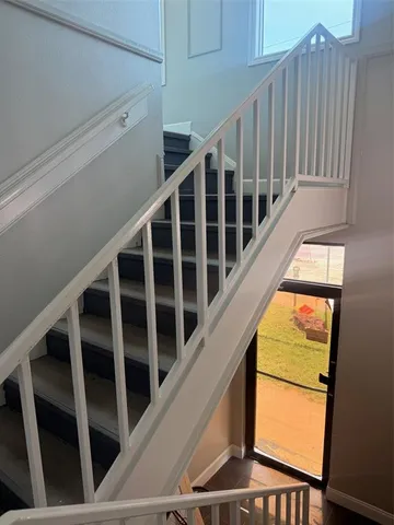 a kitchen with a refrigerator stove and microwave