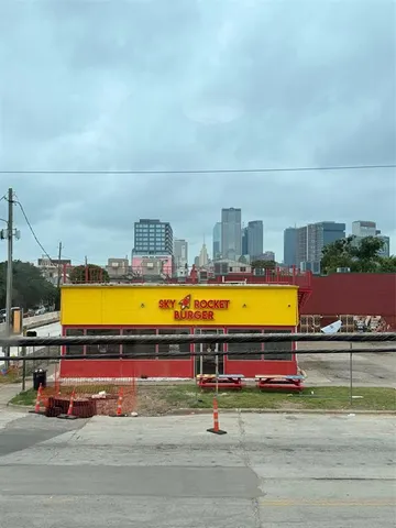 a view of swimming pool with a outdoor seating