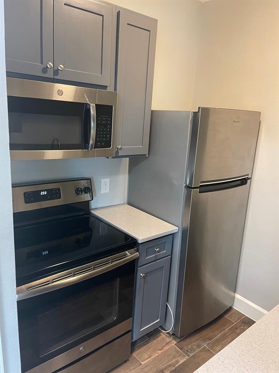 3101 Commerce Street, Unit 203 Dallas, TX 75226 - Photo 7 of 21 a kitchen with appliances and cabinets