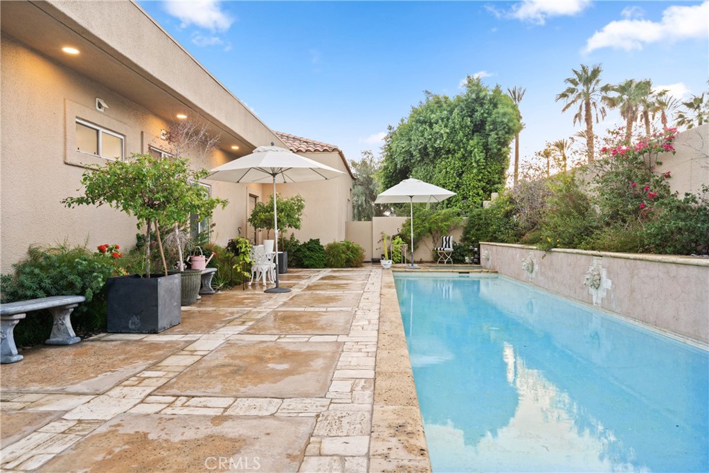 111 Augusta Drive Rancho Mirage, CA 92270 - Photo 1 of 1 a view of a terrace with a garden