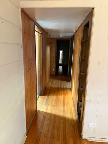 a view of a bathroom with a bathtub