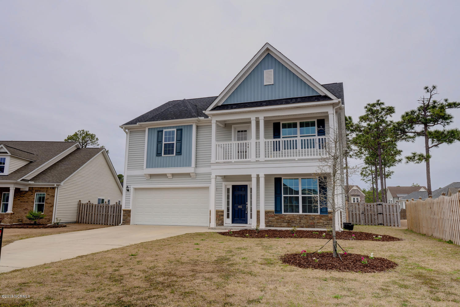 102 Porch Swing Way Holly Ridge, NC 28445 - Photo 1 of 35 102 Porch Swing