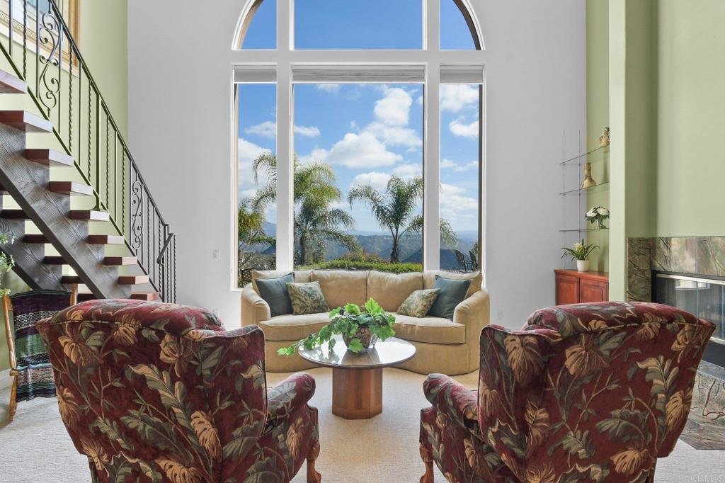 164 Dawn View Way El Cajon, CA 92021 - Photo 11 of 38 a living room with furniture and a large window