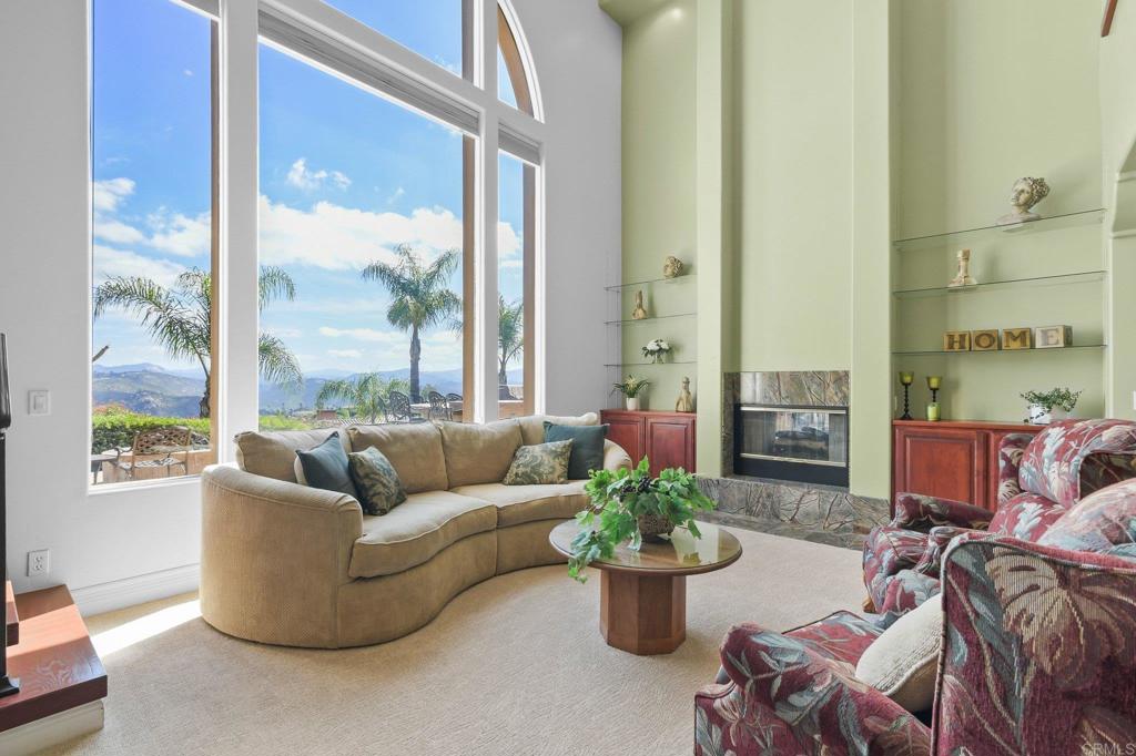 164 Dawn View Way El Cajon, CA 92021 - Photo 12 of 38 a living room with furniture a potted plant and a potted plant