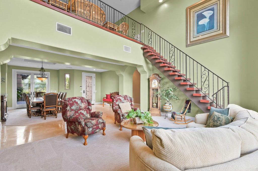 164 Dawn View Way El Cajon, CA 92021 - Photo 13 of 38 a living room with furniture and stairs