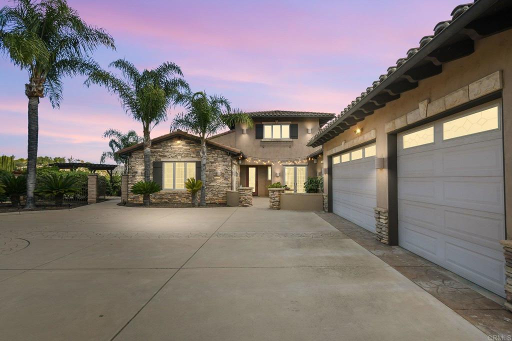 164 Dawn View Way El Cajon, CA 92021 - Photo 2 of 38 a front view of a house with a yard