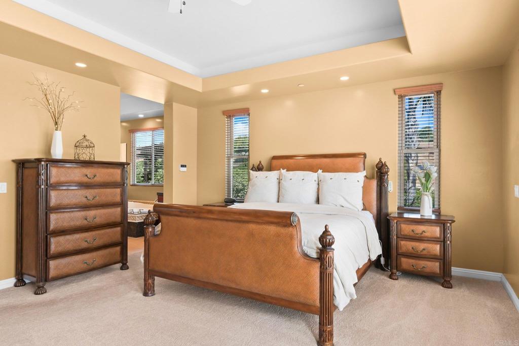 164 Dawn View Way El Cajon, CA 92021 - Photo 24 of 38 a bedroom with a bed and a dresser