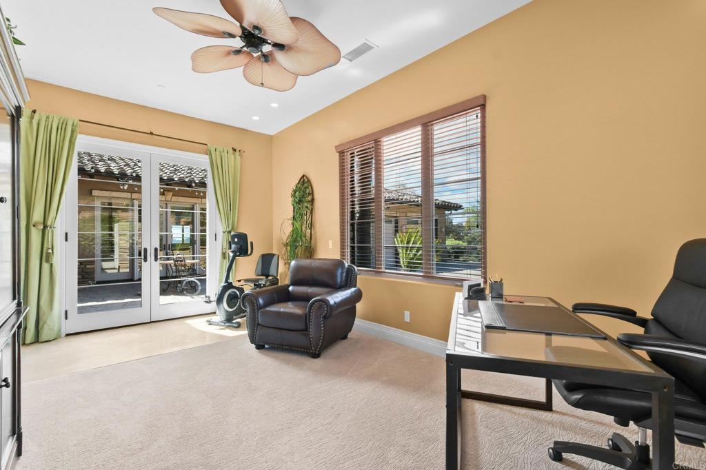 164 Dawn View Way El Cajon, CA 92021 - Photo 26 of 38 a living room with furniture and a floor to ceiling window