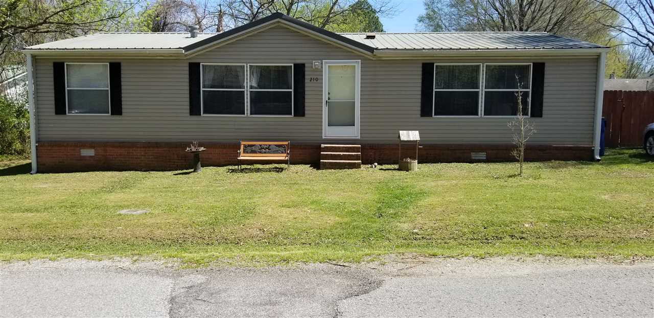 210 South Cox Street Rutherford, TN 38369 - Photo 1 of 1 a front view of house with yard