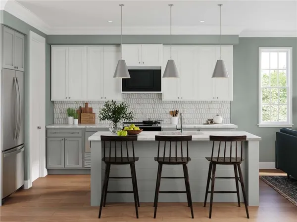 a kitchen with a table chairs refrigerator and cabinets