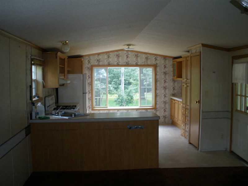 327 Howland Road Lagrange, ME 04453 - Photo 12 of 26 Living Room.