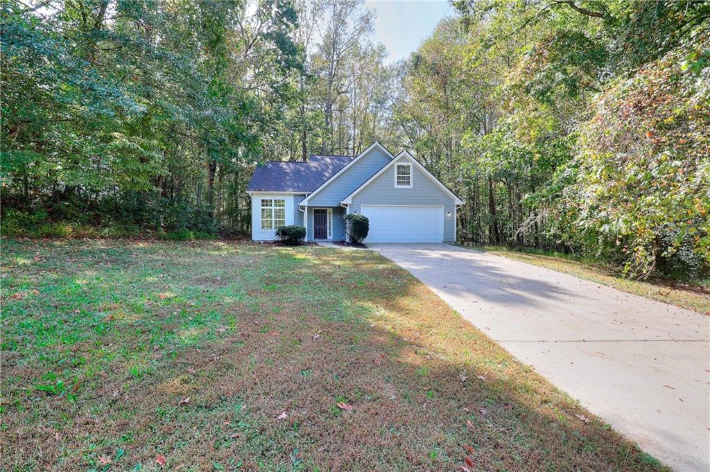 372 Ashton Way Winder, GA 30680 - Photo 1 of 29 a house with a yard