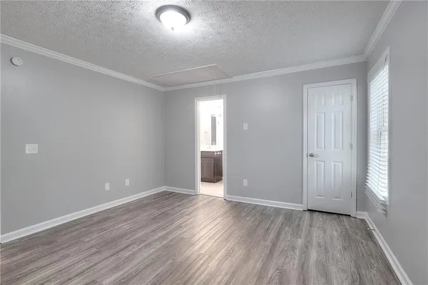 a bathroom with a sink toilet and a mirror