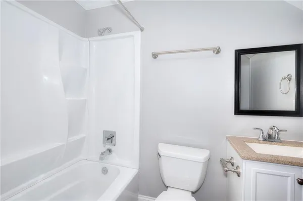 a view of wooden floor in an empty room
