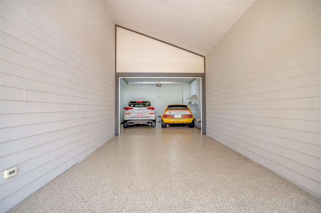 8702 San Fernando Way Dallas, TX 75218 - Photo 4 of 30 TWO CAR Garage with Epozy Floor. Garage offers AC
