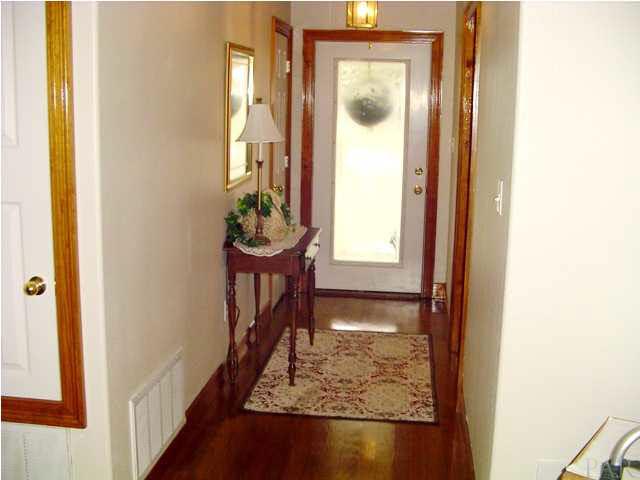 5330 Morgan Ridge Drive Milton, FL 32570 - Photo 2 of 25 Glass Door and Foyer with Beautiful Real Hardwood Flooring throughout the House