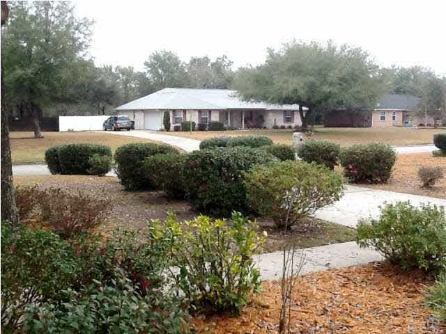 5330 Morgan Ridge Drive Milton, FL 32570 - Photo 25 of 25 Front Yard Easy Care Landscaping