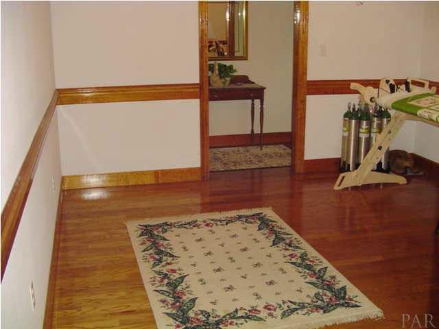 5330 Morgan Ridge Drive Milton, FL 32570 - Photo 5 of 25 Formal Dining Room with Chair rail. Access from Foyer and Kitchen
