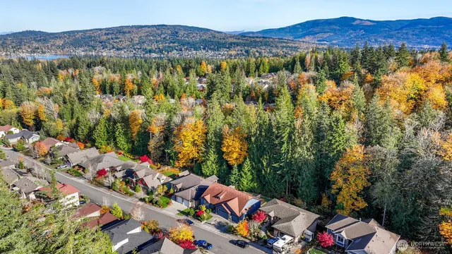 an aerial view of city and mountain