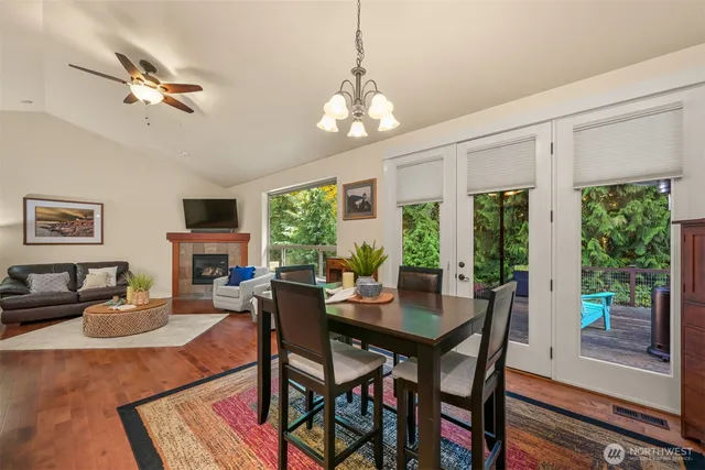 a view of a dining room with furniture window and outside view
