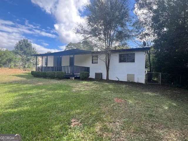 a house view with a garden space