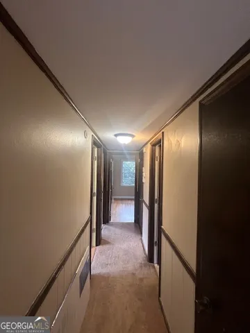 a view of hallway with stairs