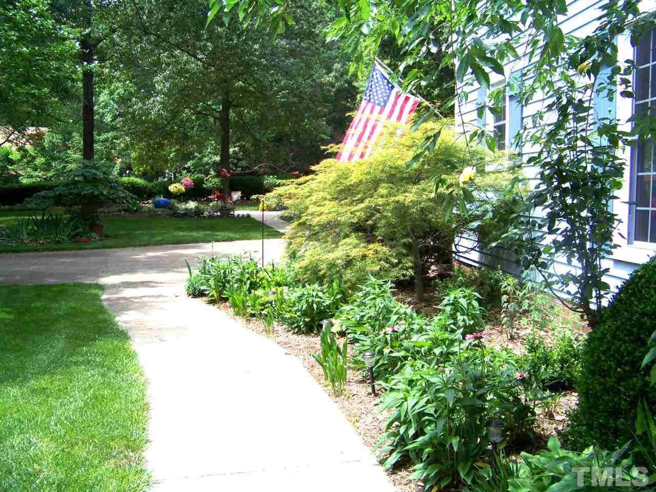 9401 Does Run Court Raleigh, NC 27613 - Photo 22 of 25 a view of a tree with a yard