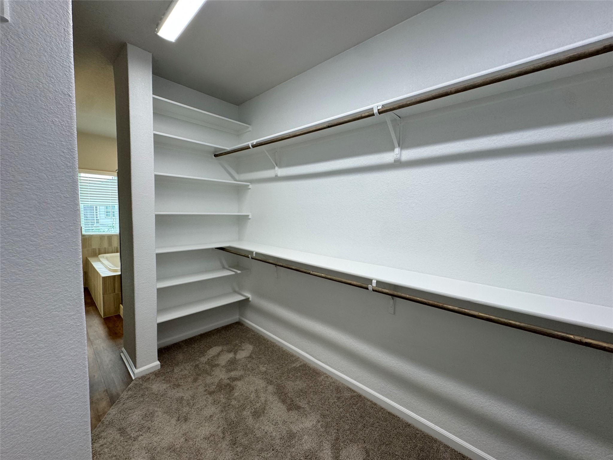 3000 Chisholm Trail Road, Unit 3 Round Rock, TX 78681 - Photo 18 of 28 a storage room with empty racks