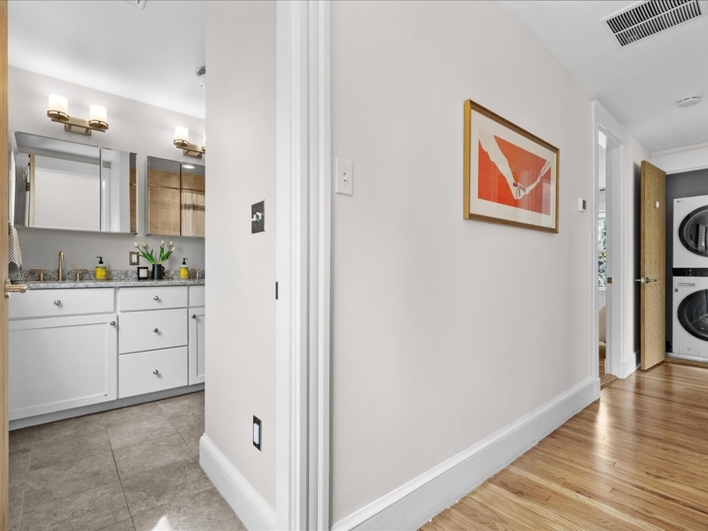 55 Coolidge Road Arlington, MA 02476 - Photo 24 of 42 a view of cabinets and wooden floor
