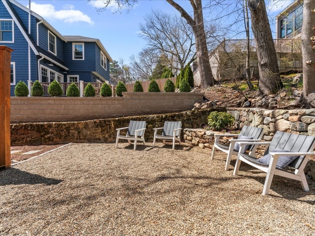 55 Coolidge Road Arlington, MA 02476 - Photo 32 of 42 a view of a chairs and tables in the patio